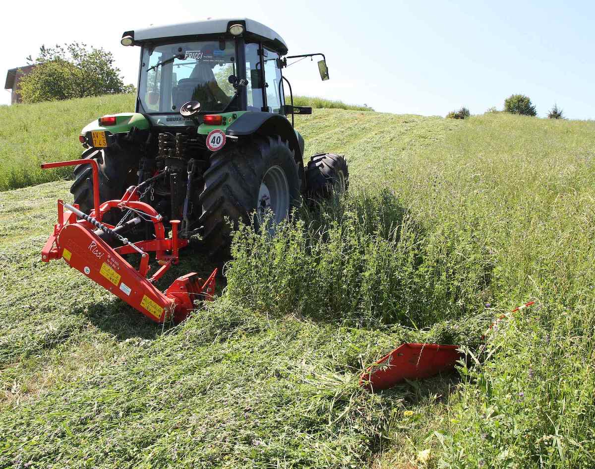 Fiore Hydraulic Lift Sickle Bar Mower Working on Hillside