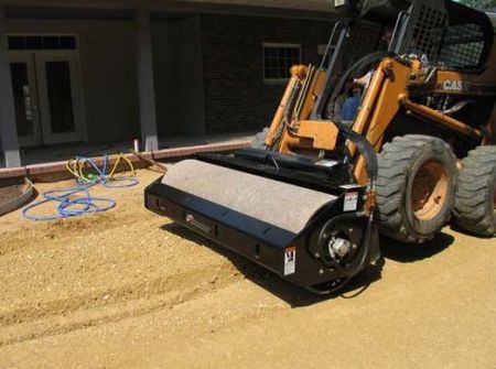 Vibratory roller with smooth drum